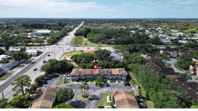 Welcome to this inviting 2-bedroom, 1.5-bath townhouse located - photo 3