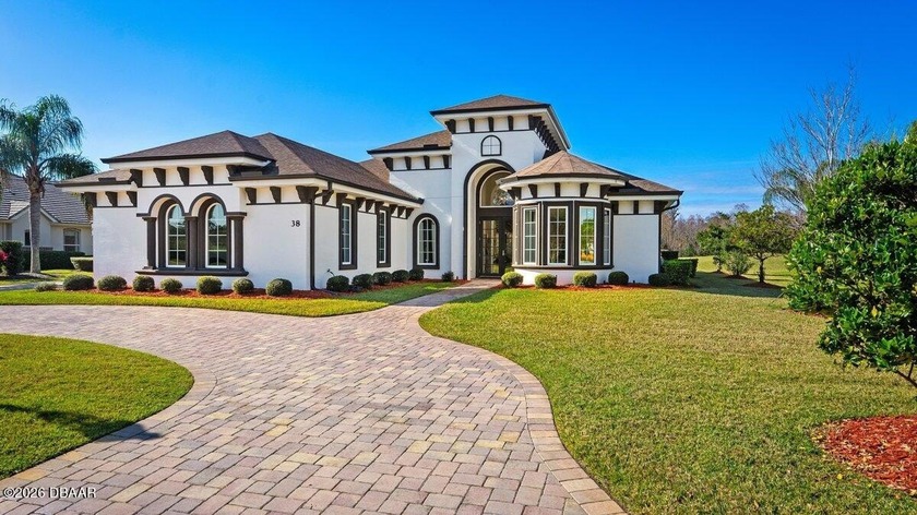 Welcome to 38 Lionspaw Grand, an immaculate Kargar Custom Home - photo 4