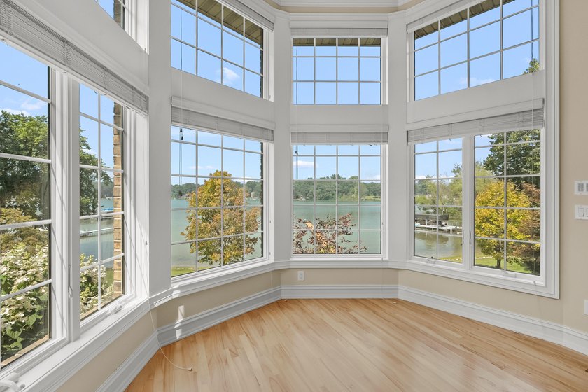 A Lakefront Legacy Estate - 225' Private Shoreline | 1.9 Acres | - photo 9