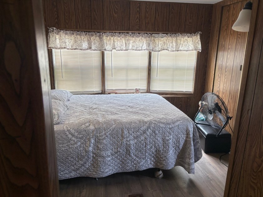 This home is located on the Canal to Lake Huntley and offers 3 - photo 14