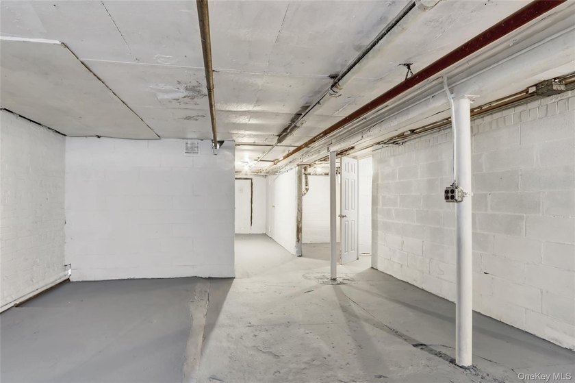 This attractive triplex has a beautifully restored facade that - photo 24