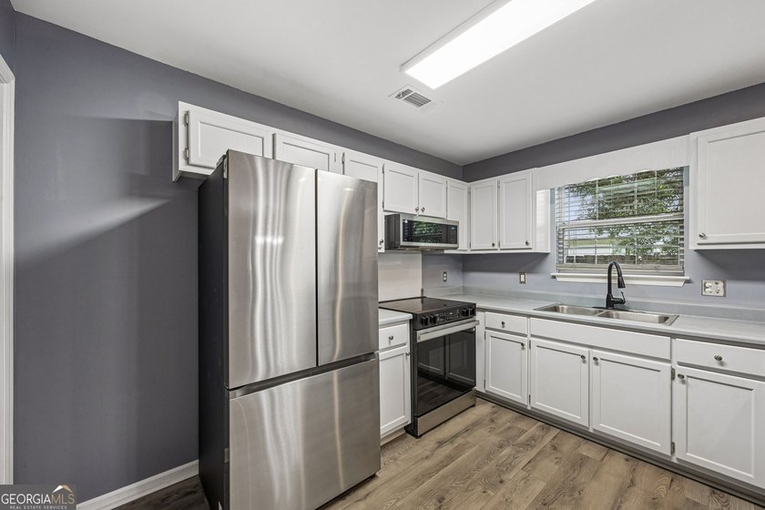Offering 1,872 square feet of versatile living space, this - photo 22