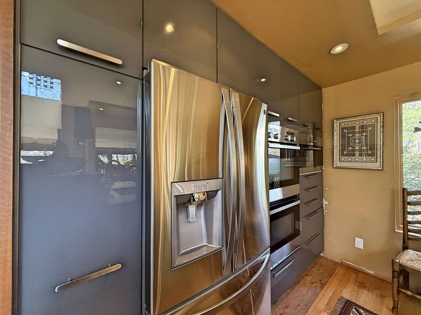 A Very Unique, Spacious Custom Designed Home Surrounded by - photo 9