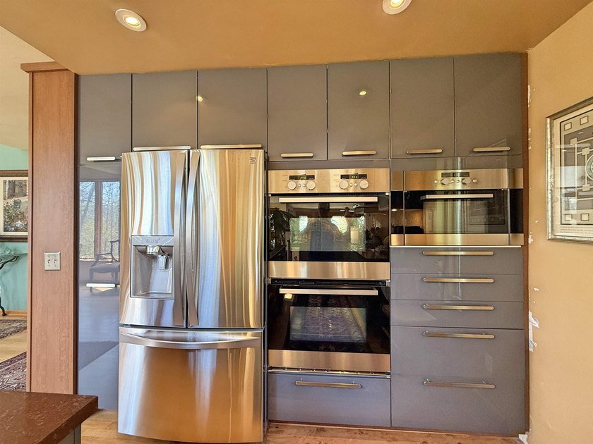 A Very Unique, Spacious Custom Designed Home Surrounded by - photo 10