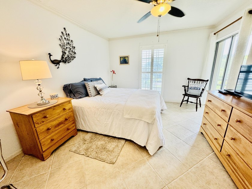 Charming 1-bedroom, 1.5-bath condo with serene east-facing water - photo 18