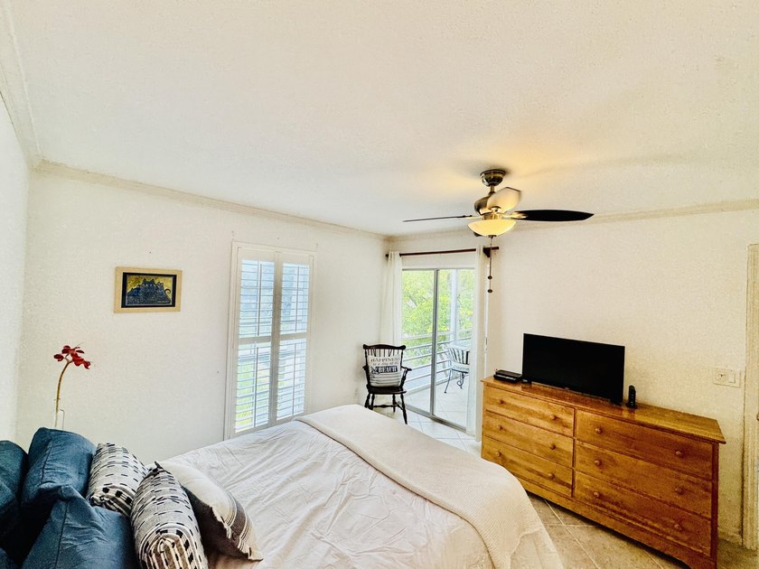 Charming 1-bedroom, 1.5-bath condo with serene east-facing water - photo 19