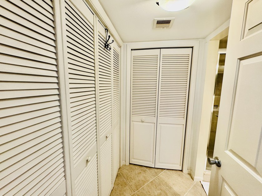 Charming 1-bedroom, 1.5-bath condo with serene east-facing water - photo 22
