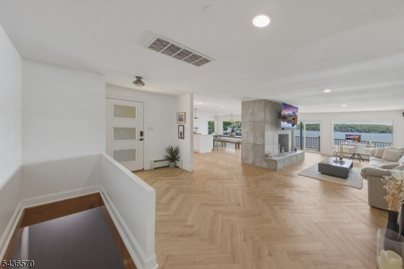 Welcome to this beautifully renovated lakefront retreat offering - photo 11