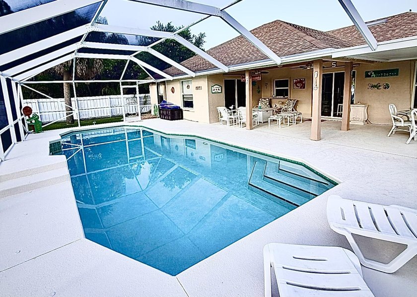 Welcome to this inviting three-bedroom, two-bathroom - photo 12
