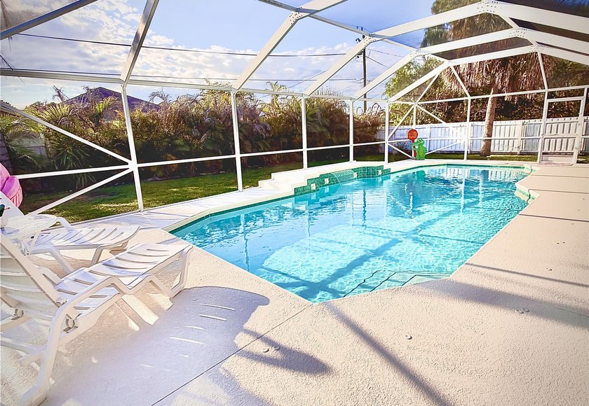 Welcome to this inviting three-bedroom, two-bathroom - photo 13