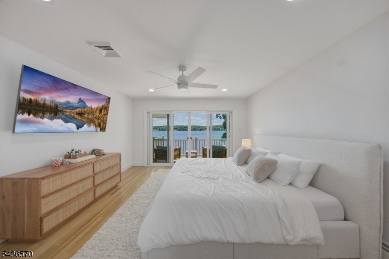 Welcome to this beautifully renovated lakefront retreat offering - photo 15