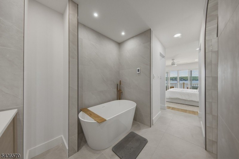 Welcome to this beautifully renovated lakefront retreat offering - photo 17