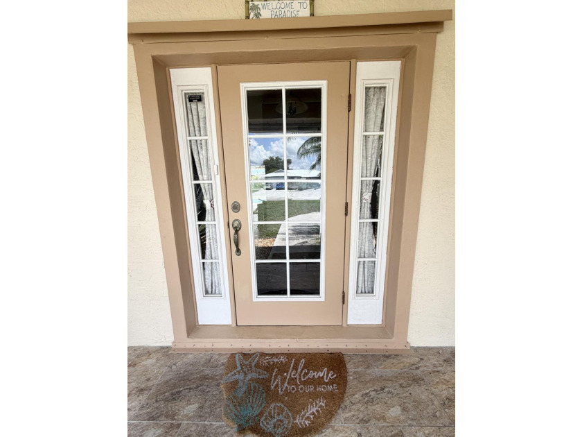 Welcome to this inviting three-bedroom, two-bathroom - photo 21
