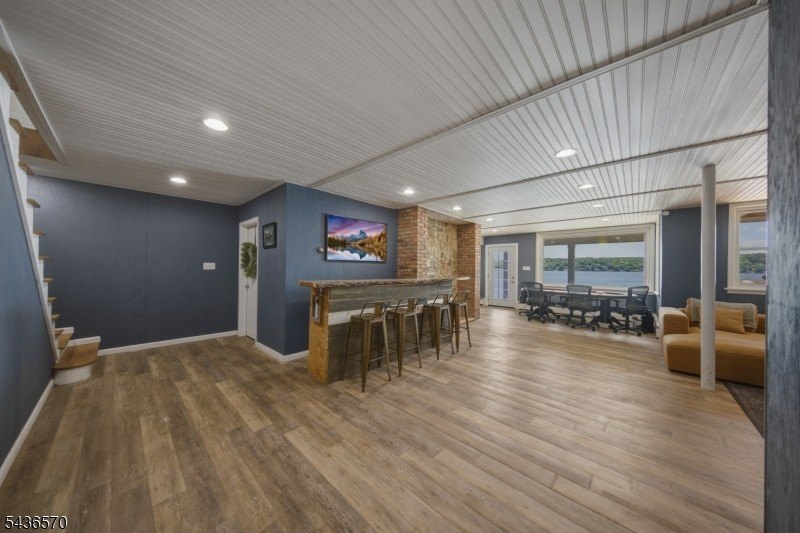 Welcome to this beautifully renovated lakefront retreat offering - photo 23