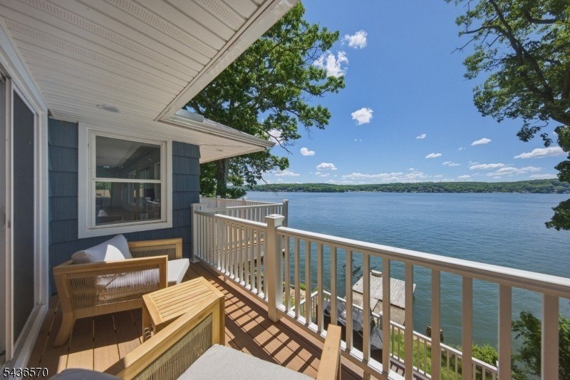 Welcome to this beautifully renovated lakefront retreat offering - photo 31