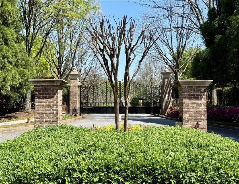 Welcome home to the exclusive gated Enclave of Weston. This John - photo 50
