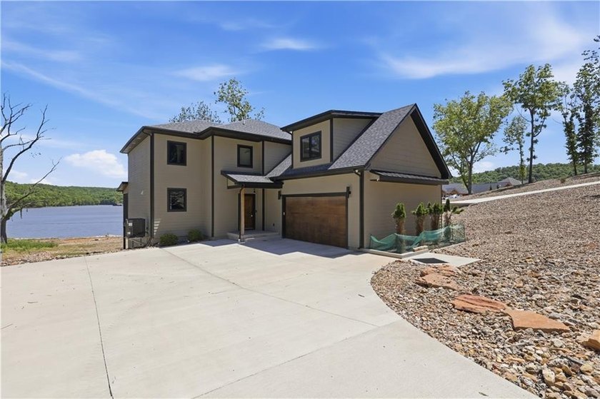 New Construction with Dock! Spectacular Views from the covered - photo 2