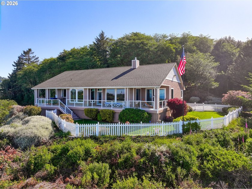 Perched above the coastline with breathtaking panoramic views of - photo 4
