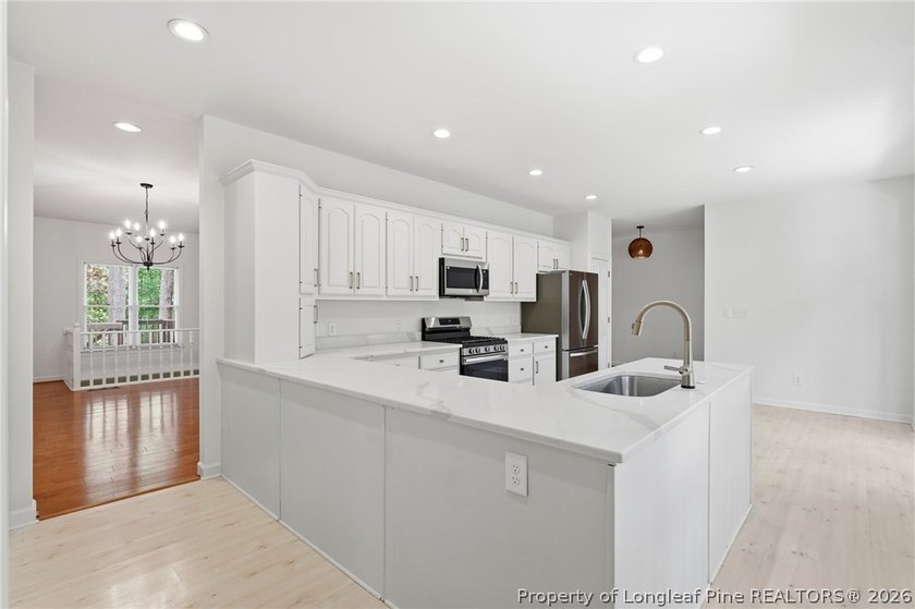 Exceptional home nestled on over one acre within the exclusive - photo 12