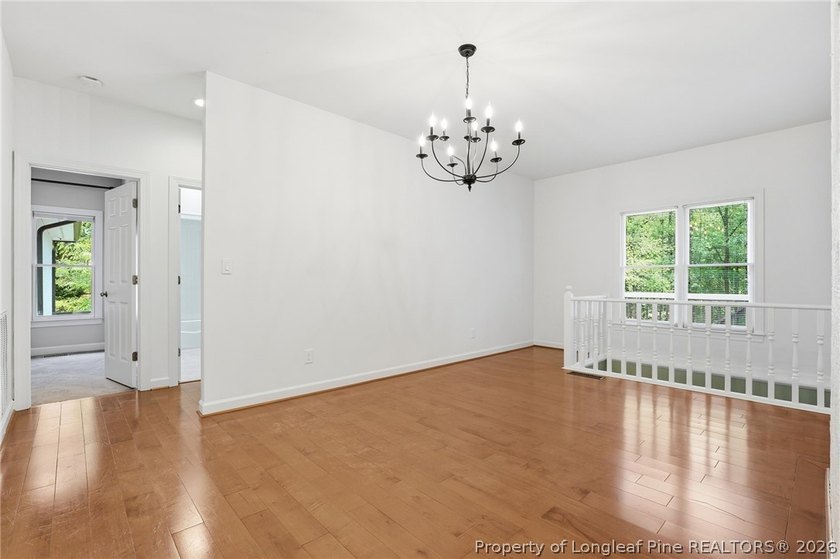Exceptional home nestled on over one acre within the exclusive - photo 16