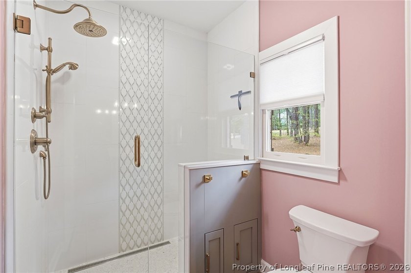 Exceptional home nestled on over one acre within the exclusive - photo 22