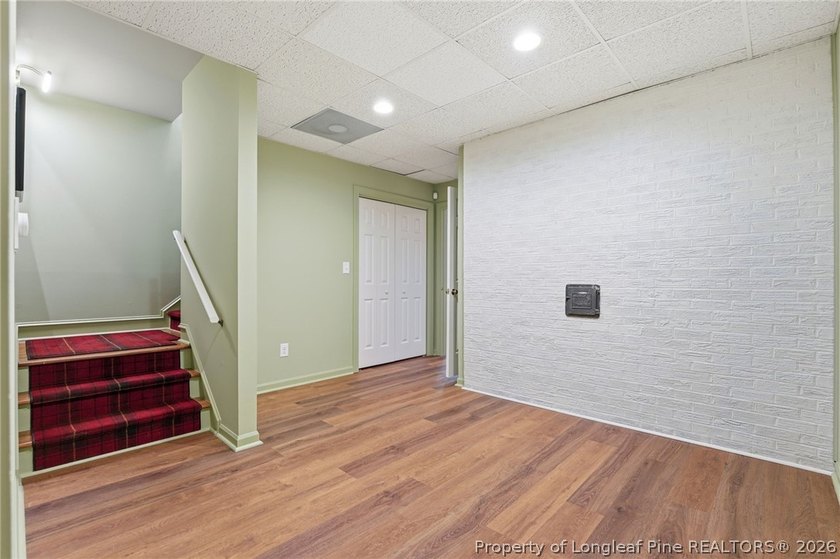 Exceptional home nestled on over one acre within the exclusive - photo 25