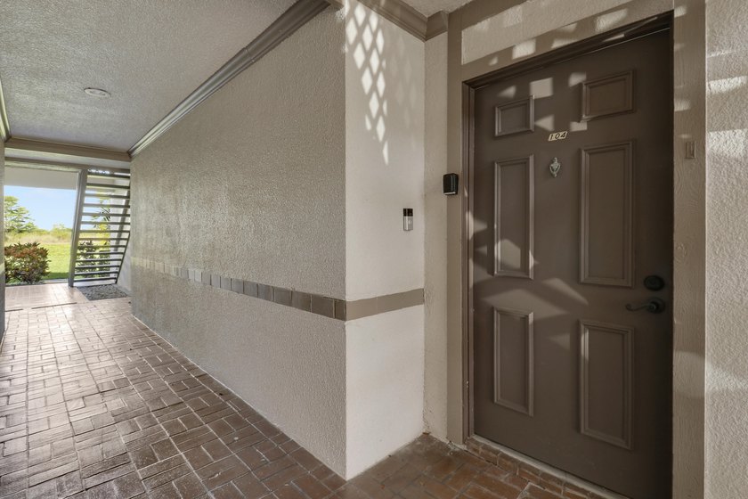 Welcome home to the tranquil community of Dunbar Woods, nestled - photo 4