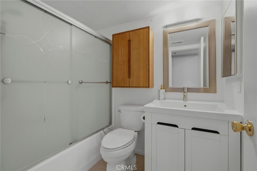 Tucked inside the gated Chelsea Court community in the heart of - photo 11