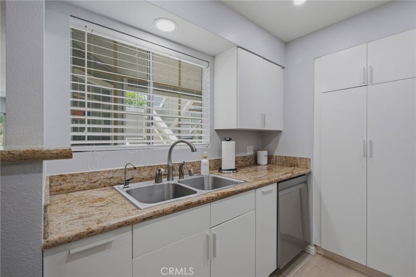Tucked inside the gated Chelsea Court community in the heart of - photo 16