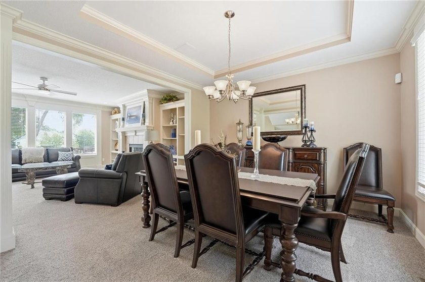 ELEGANT TWO-STORY IN PRESTIGIOUS FALCON RIDGE! Nestled in one of - photo 7