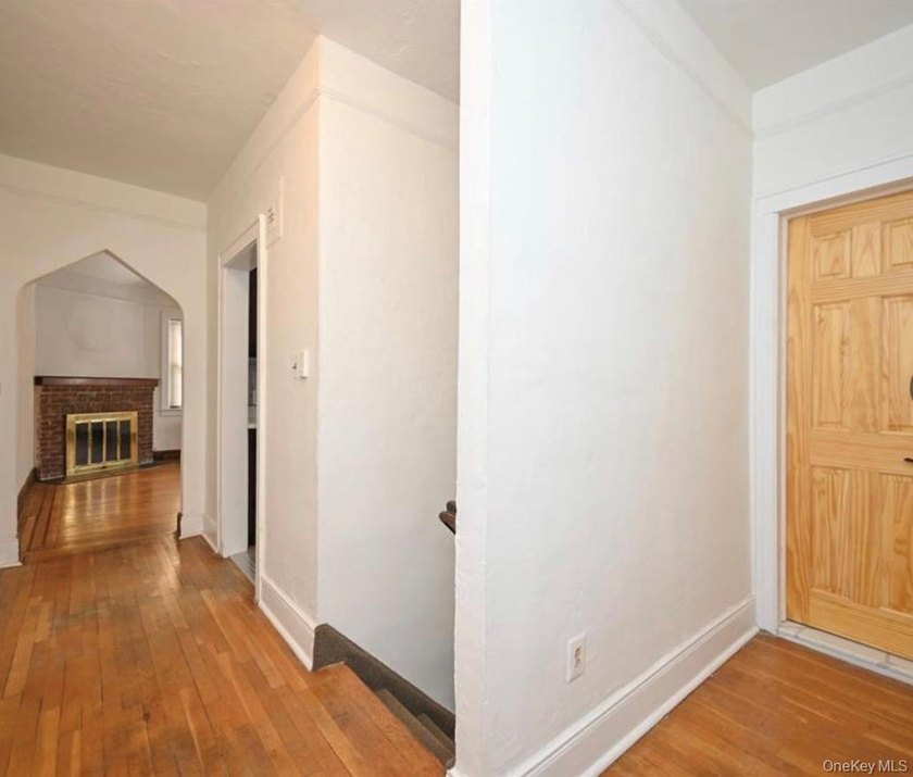 Opportunity is knocking with this legal 8-family Tudor in the - photo 4