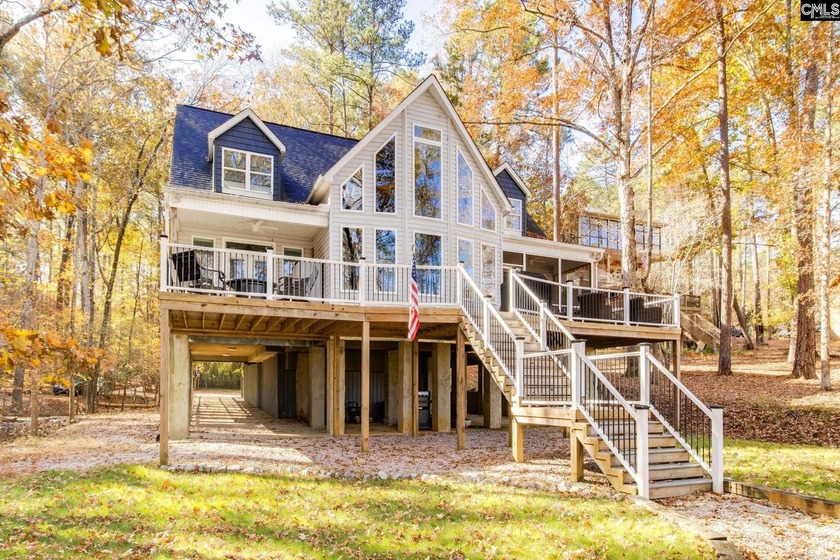REDUCED! Beautiful Lake front home on a 1.83-acre wooded lot. - photo 2