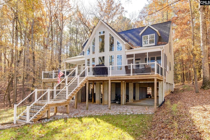 REDUCED! Beautiful Lake front home on a 1.83-acre wooded lot. - photo 3