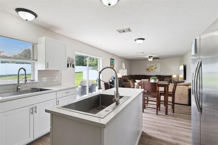Virtually Staged. Experience elevated living in the gated - photo 11