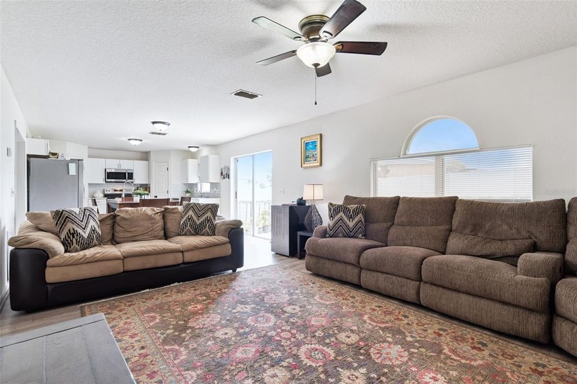 Virtually Staged. Experience elevated living in the gated - photo 15