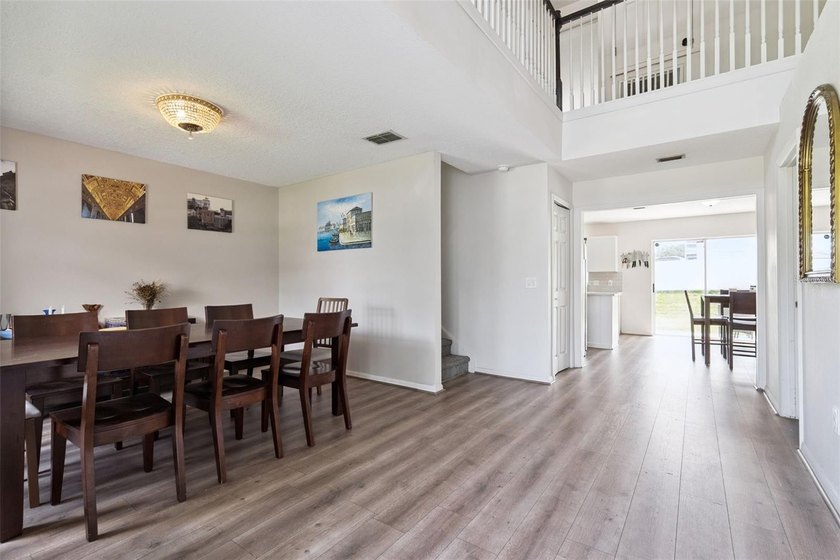 Virtually Staged. Experience elevated living in the gated - photo 18