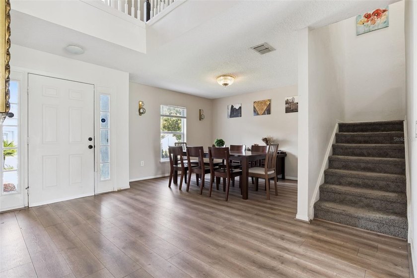 Virtually Staged. Experience elevated living in the gated - photo 19