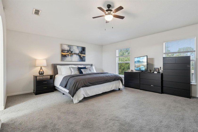 Virtually Staged. Experience elevated living in the gated - photo 22