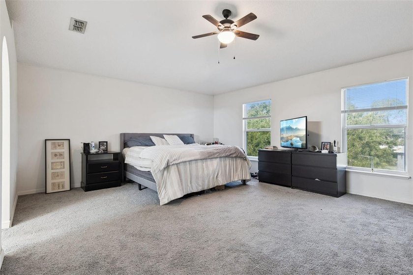 Virtually Staged. Experience elevated living in the gated - photo 23