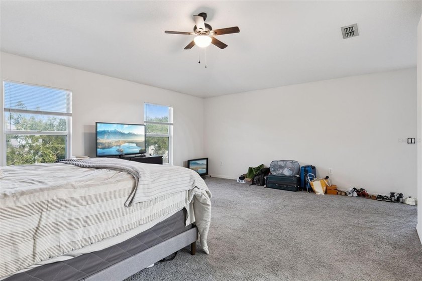 Virtually Staged. Experience elevated living in the gated - photo 25
