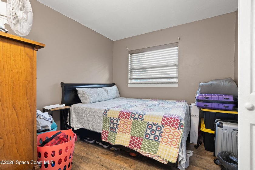 Welcome to this well-maintained concrete block 4 bedroom, 2-bath - photo 12