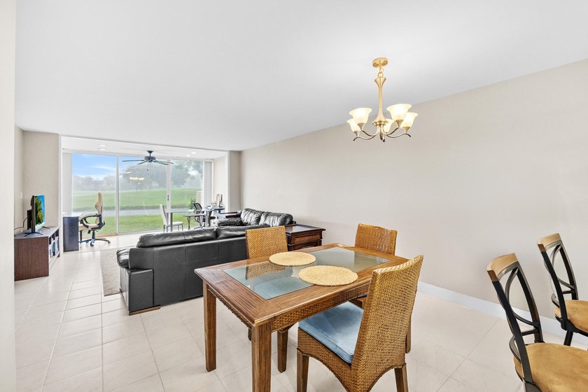 Wake up to tranquil lake and golf course views in this - photo 10