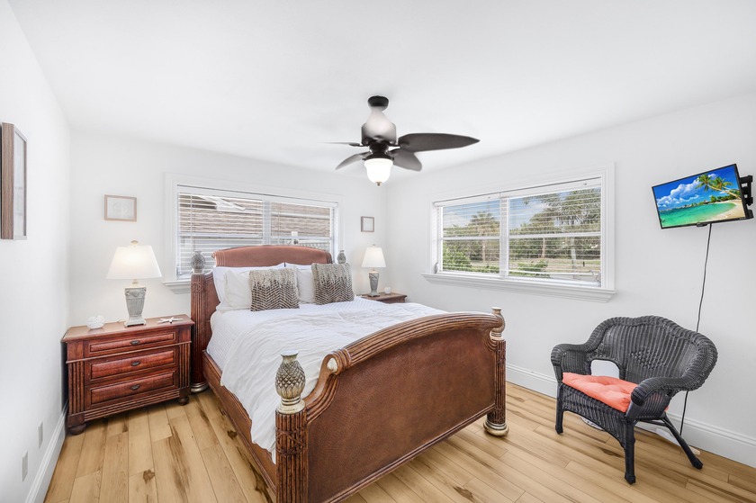 Step into this beautifully updated 3-bedroom island retreat on - photo 12