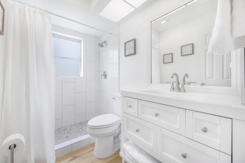 Step into this beautifully updated 3-bedroom island retreat on - photo 14