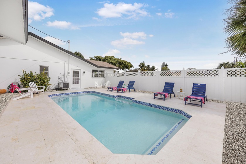 Step into this beautifully updated 3-bedroom island retreat on - photo 17