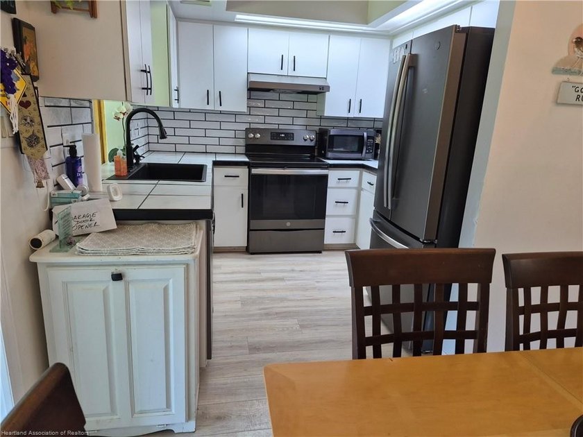 This lovely villa is located in a highly desirable 55+ Community - photo 9