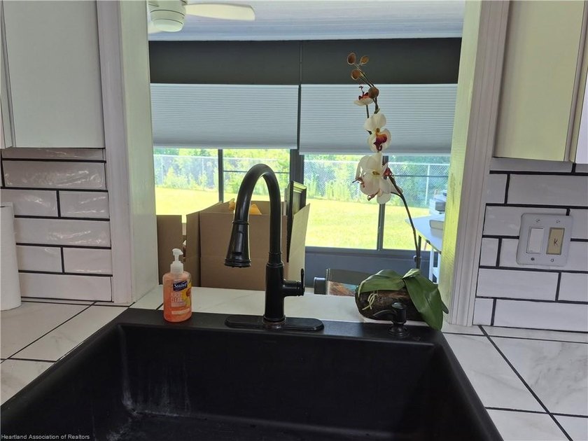 This lovely villa is located in a highly desirable 55+ Community - photo 10