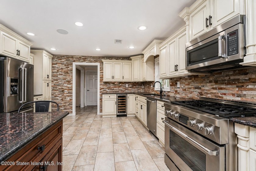 Welcome to 699 Ionia Avenue, a stunning brick-front center hall - photo 15
