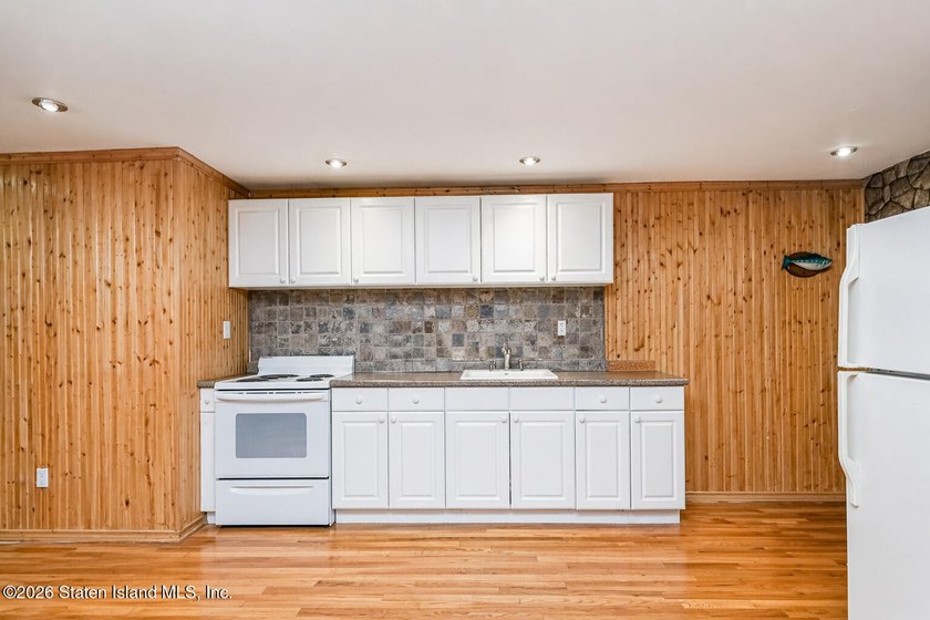 Welcome to 699 Ionia Avenue, a stunning brick-front center hall - photo 44