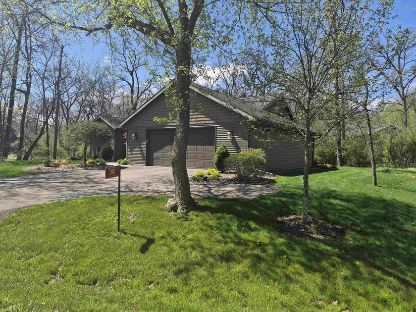 GORGEOUS COUNTRY FREE STANDING CONDO ON WOODED LOT W/WATER - photo 2